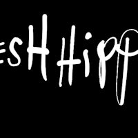 fresh hippie logo on a black background